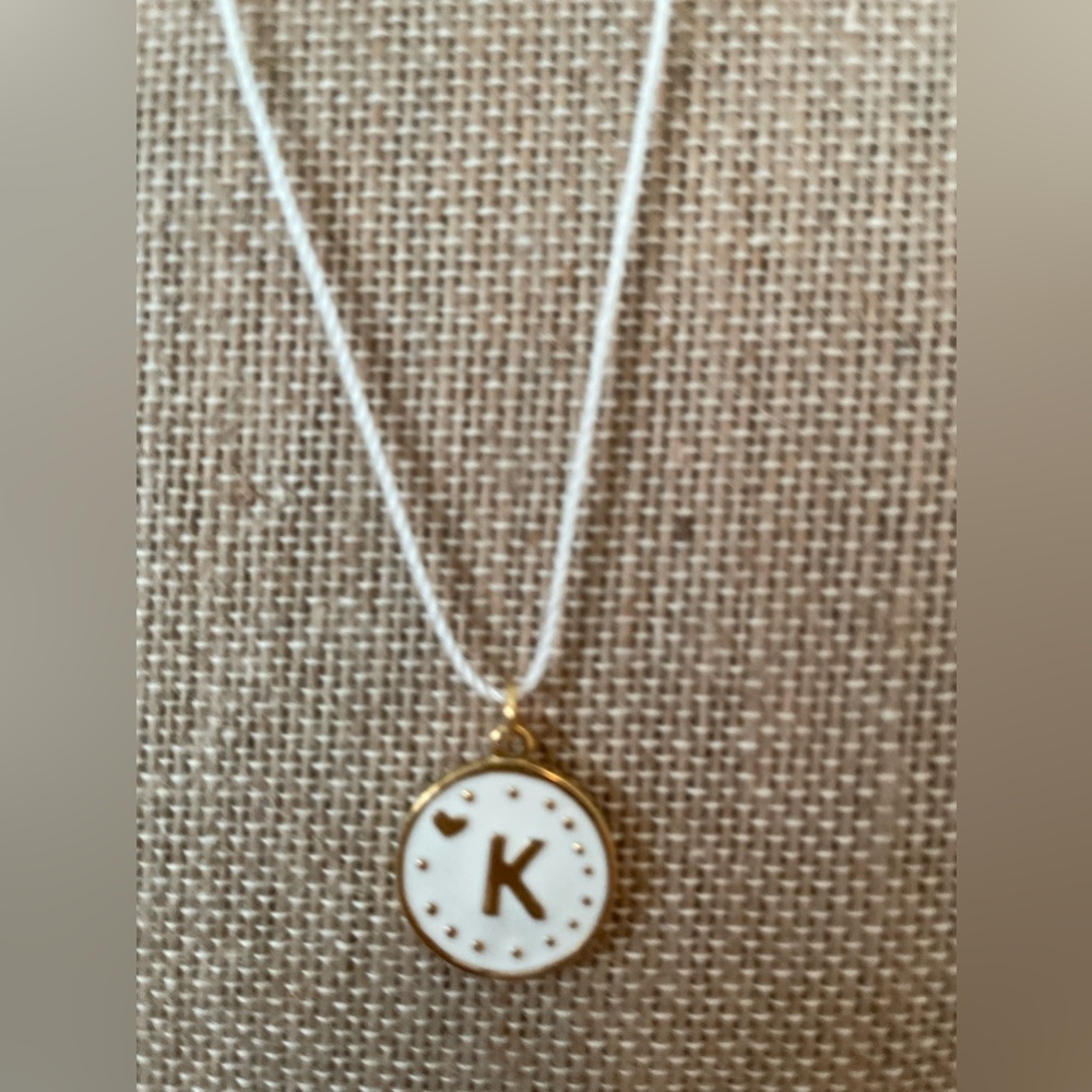 Blee Inara gold plated white enamel cord 18” necklace. Letter K. Never worn.